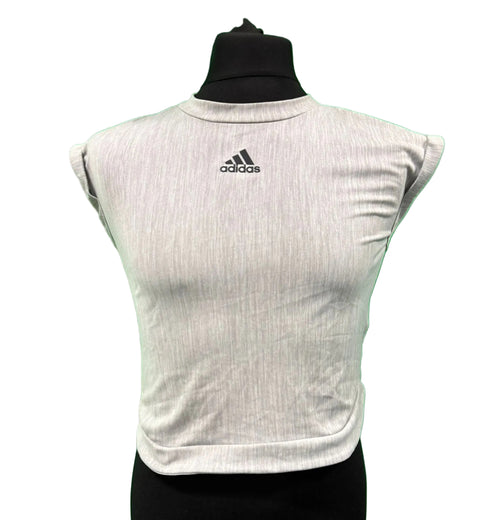 Front view of a light grey Adidas mesh training top for women displayed on a mannequin with a green background