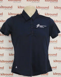 Front view of adidas Performance navy polo shirt with International Series Morocco logo