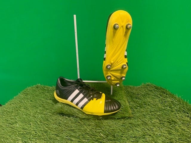 Pair of lightly used adidas FF80 rugby boots in black and yellow for soft ground, showing top and sole views