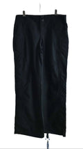 Front view of black Adidas woven cargo trousers 