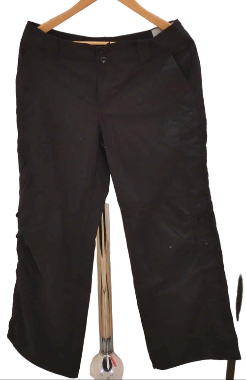 Front view of Adidas black woven cargo trousers size 16 on hanger