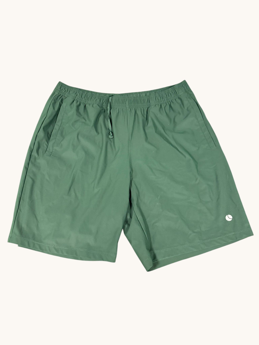 Bjorn Borg Men's green tennis shorts with elastic waistband, drawstring, and side pockets. Lightweight performance material.