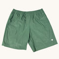 Bjorn Borg Men's green tennis shorts with elastic waistband, drawstring, and side pockets. Lightweight performance material.