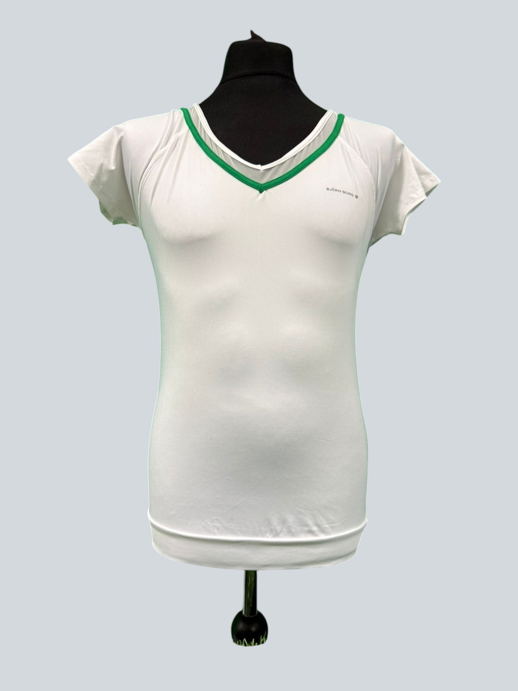 Bjorn Borg white V-neck tennis top with green trim and mesh back detail. Women's size S.
