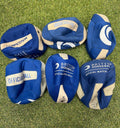 Set of six blue and white British Dodgeball official size 3 dodgeballs on grass