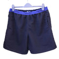 Front view of Calvin Klein black swim shorts with blue branded waistband