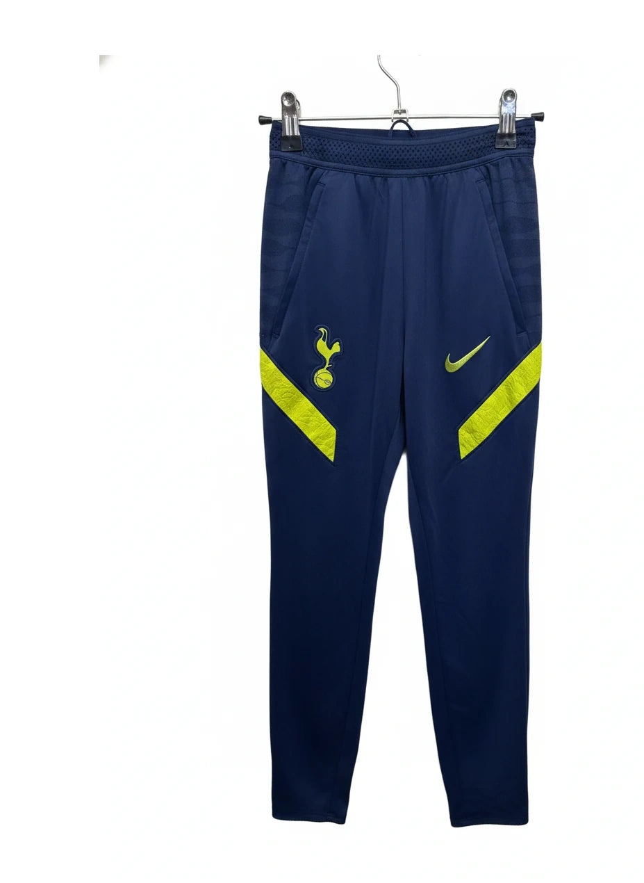 Enhanced Front view of navy blue Nike Tottenham Hotspur Dri-FIT training pants with yellow accents