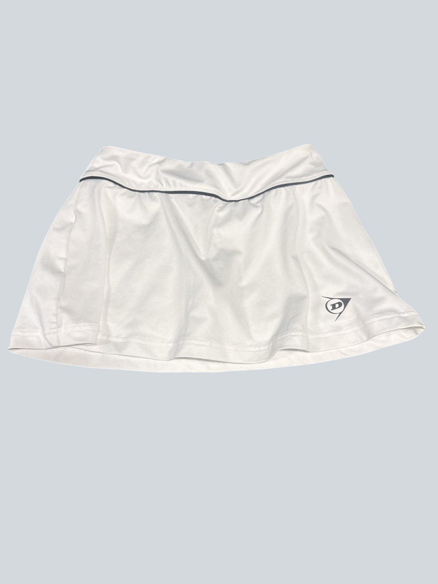 Dunlop white tennis skirt with elasticated waistband and dark trim. Features a subtle Dunlop logo on the hem.