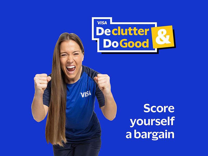 Fran Kirby poses in front of a blue background with a Visa Declutter and Do Good logo