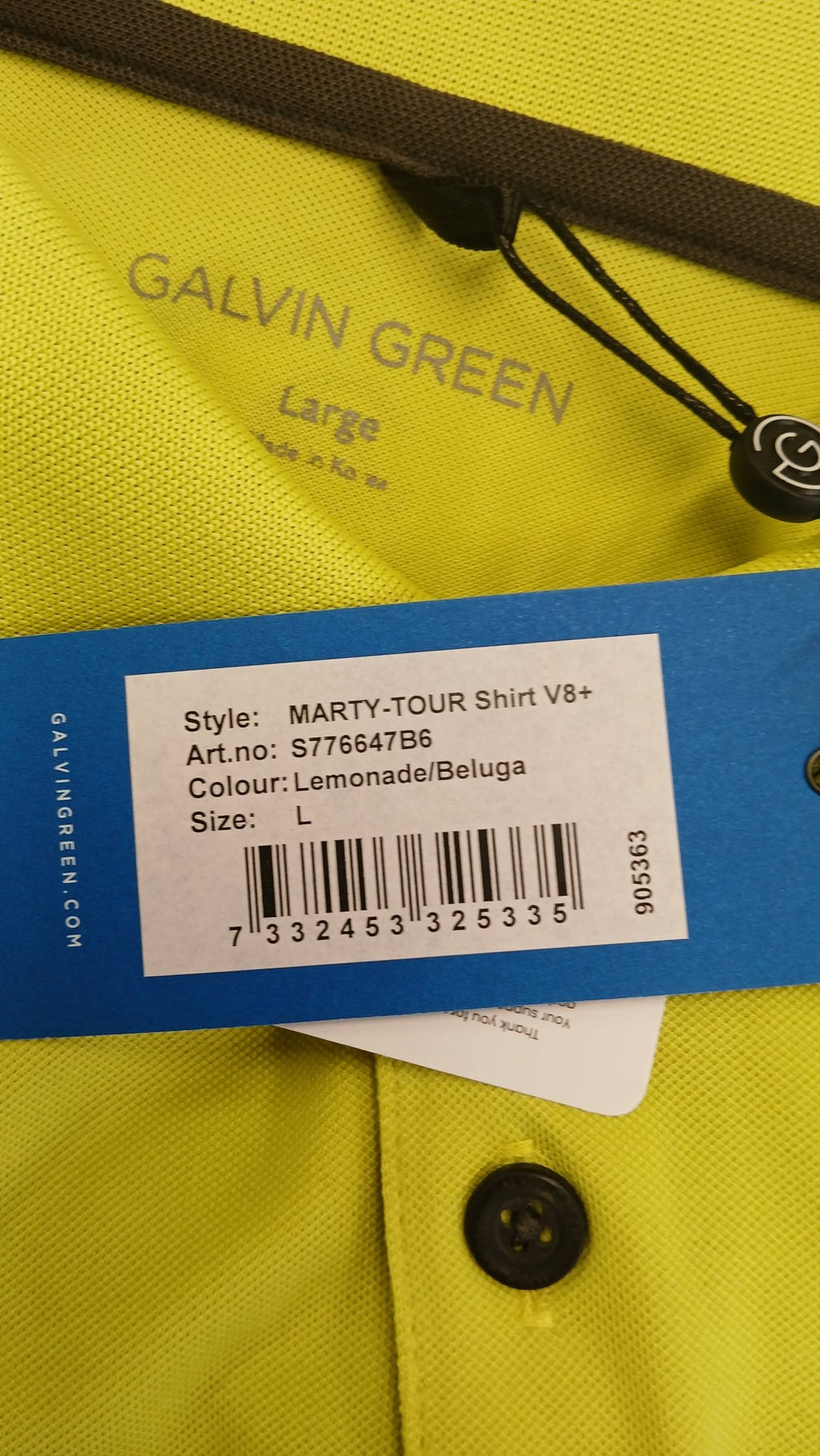Close-up of tags showing Galvin Green MARTY-TOUR Shirt V8+ details, size L, Lemonade/Beluga