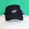Front view of Yonex black cap with white logo