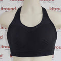 Front view of black Gymshark sports bra on mannequin with racerback design