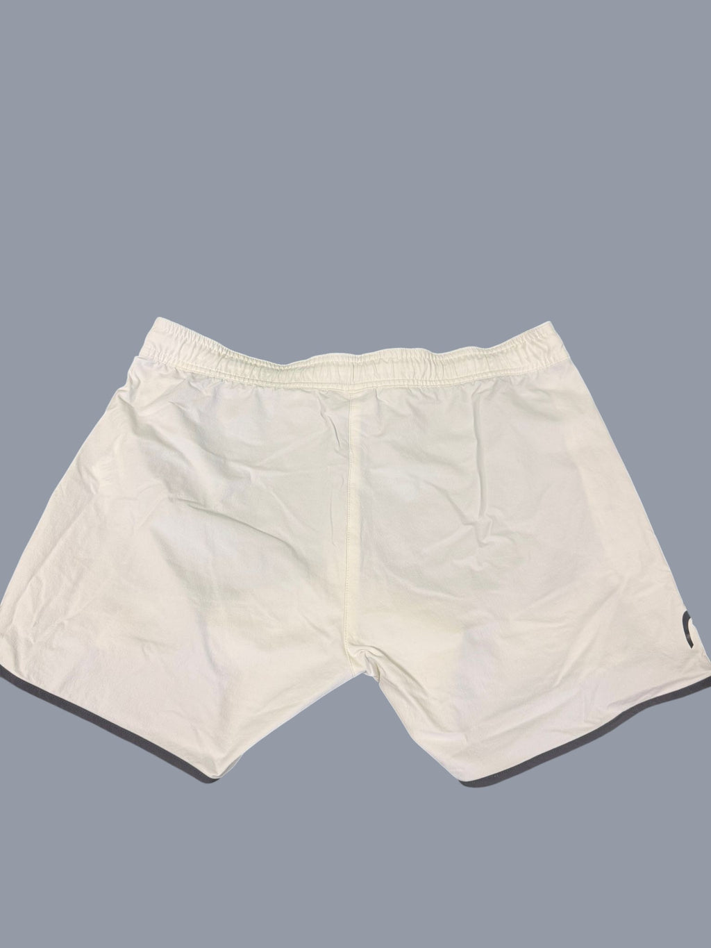 Head white tennis shorts for men with grey piping and drawstring elastic waistband.