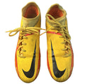 Pair of yellow Nike Phantom GT football boots viewed from above