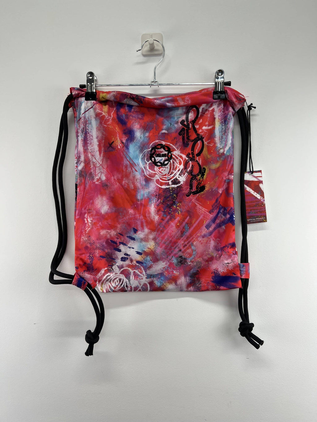 Front view of England Netball Graffiti Roses drawstring sports bag with vibrant graffiti-inspired design