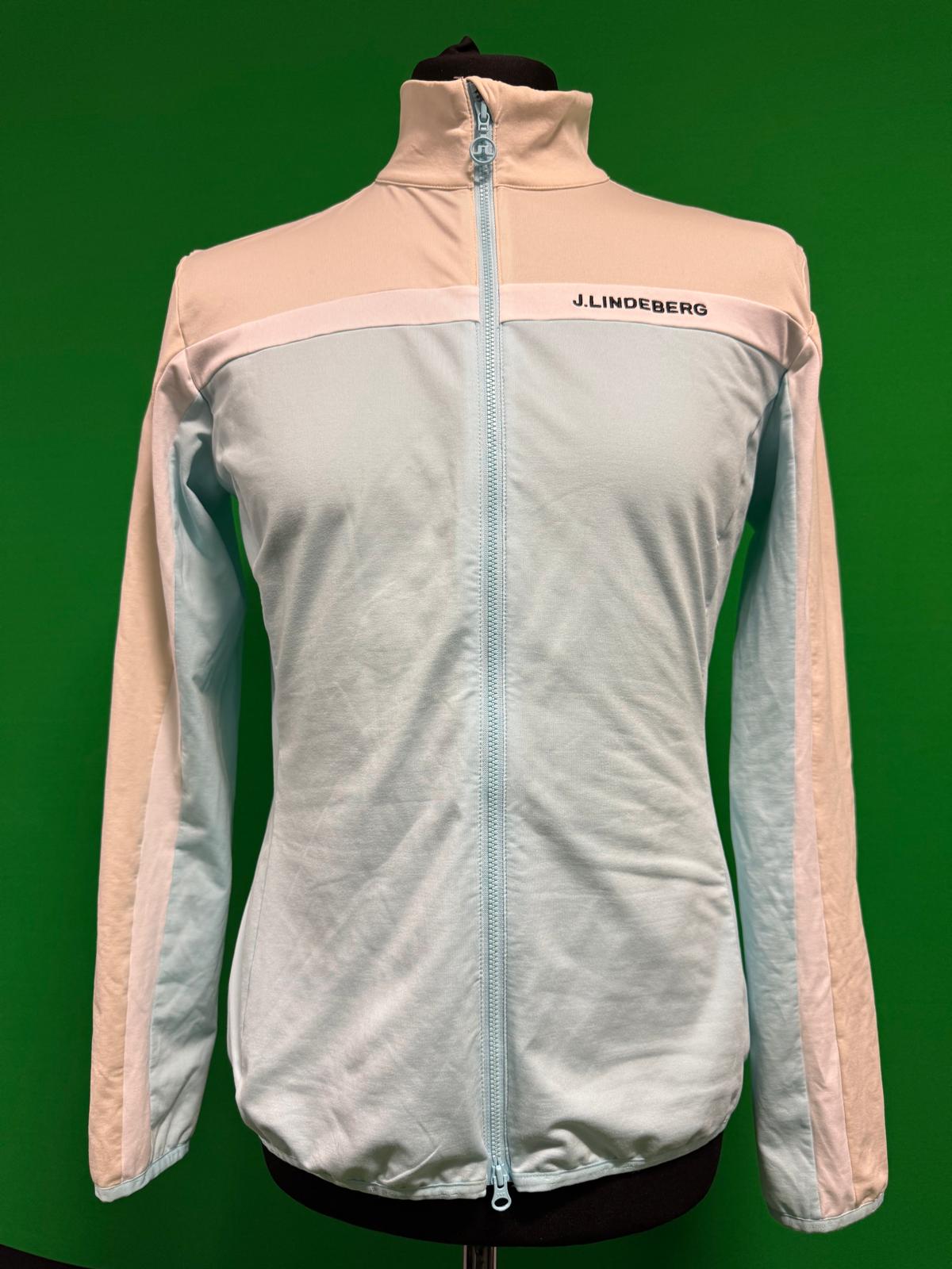 Front view of J.Lindeberg women's light blue and cream zip up track top displayed on a mannequin