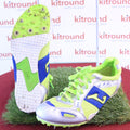 Joma lightweight yellow and blue track spikes showing sole with metal spikes and mesh design