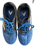 Pair of adidas kids football boots in blue and black, viewed from above