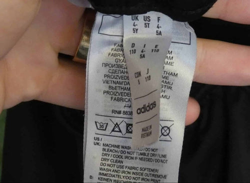 Close-up of adidas branding and care label inside Juventus shorts