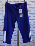 Front view of blue adidas Climalite tracksuit bottoms with tags