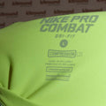 Close-up of inner label showing Nike Pro Combat branding, Dri-FIT, size large and compression details