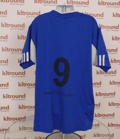 Back view of blue Adidas Shanghai International football shirt with number 9 and printed website