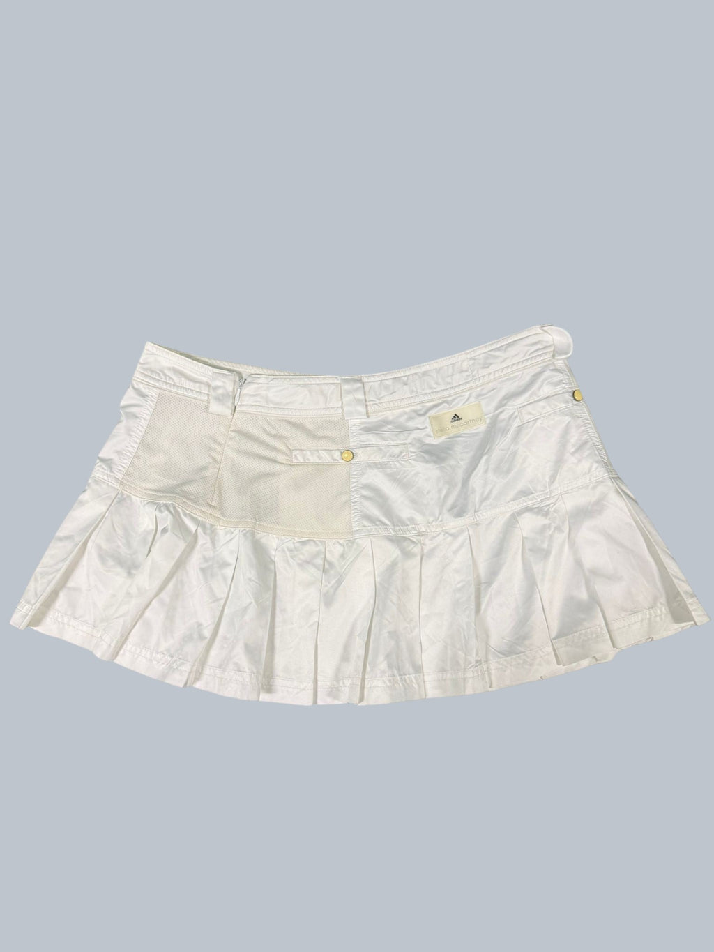 Adidas Stella McCartney white tennis skirt with pleated hem and mesh panels. Size 12.