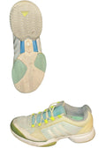 kitround adidas white and light blue mesh tennis shoes with yellow accents and durable sole for stability and grip.