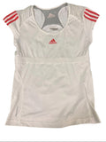 Adidas women's white tennis top with red detailing on sleeves and logo. Breathable fabric with Formotion technology.
