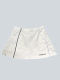 kitround Babolat white tennis skirt with black accents, lightweight and breathable fabric for athletic fit.