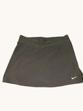 Black Nike women's tennis skirt with elasticated waistband and embroidered swoosh logo. Size XS.