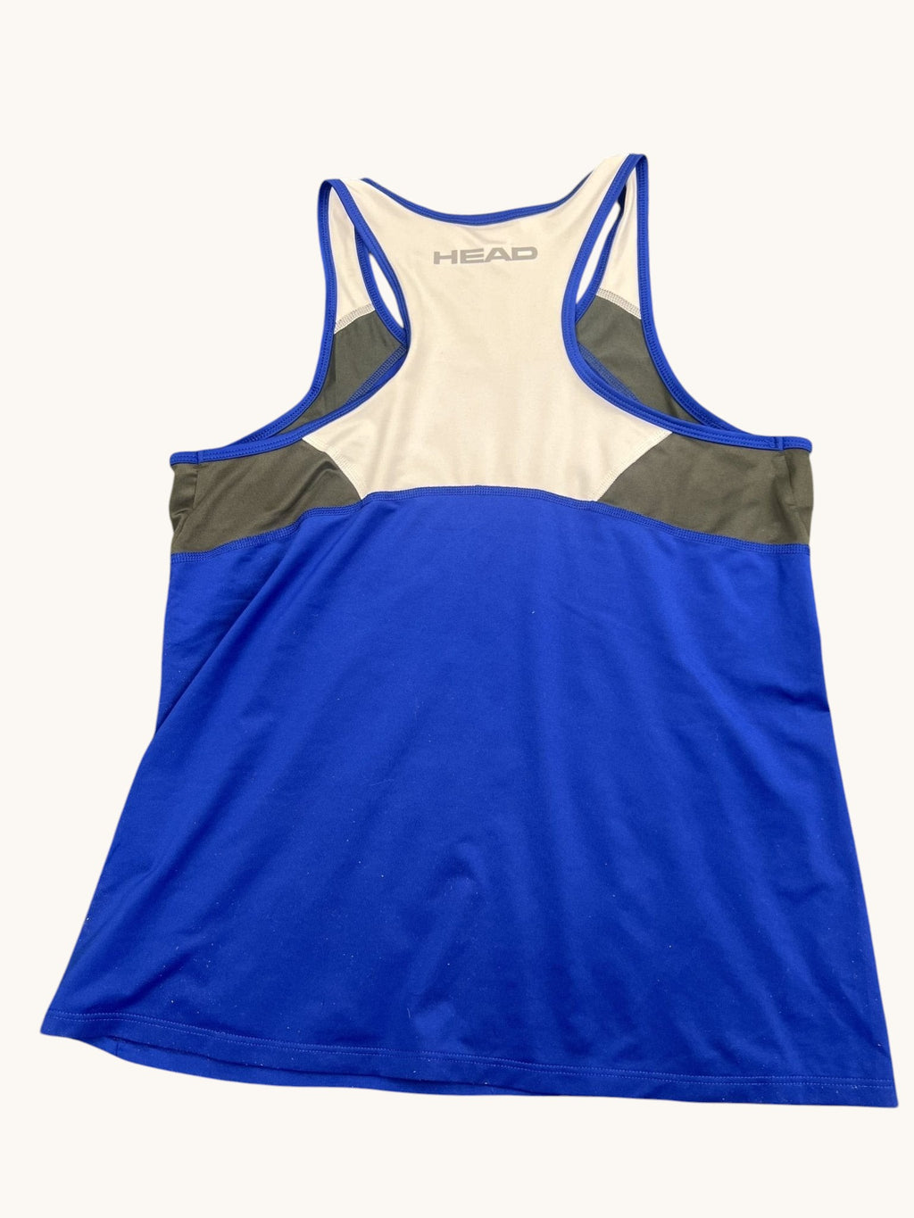 kitround Head MXM sports top in dark blue with cream and grey accents. Racerback design with moisture management technology.