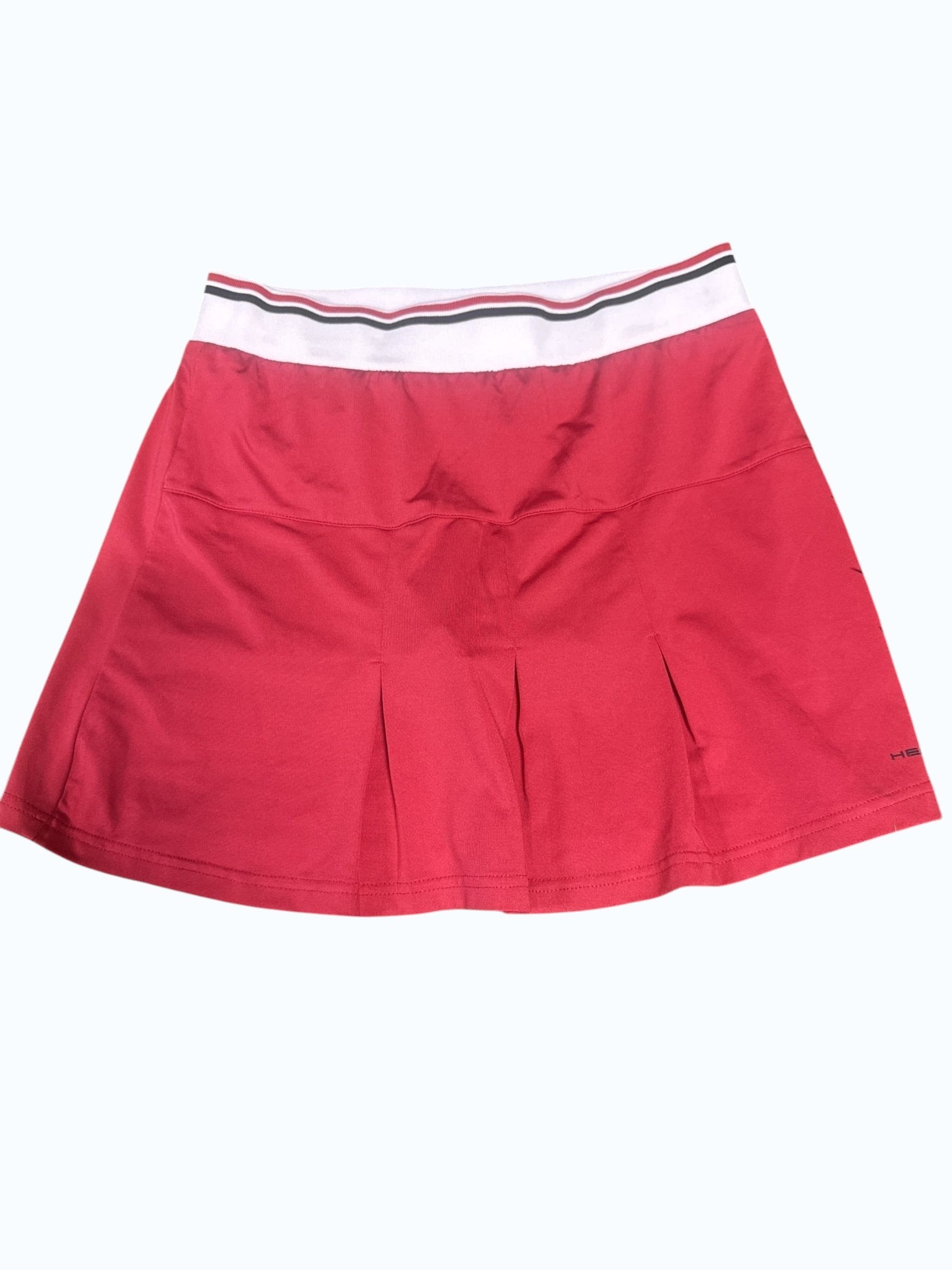 Kitround Head red pleated tennis skirt with white waistband and black stripes, women's size.