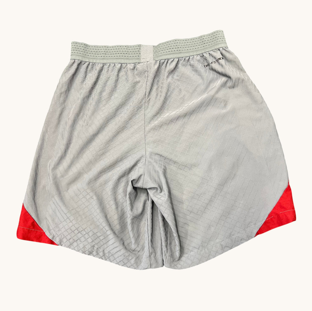kitround Liverpool FC Nike Dri Fit shorts in light grey with red accents and a subtle diamond pattern. Squad worn.