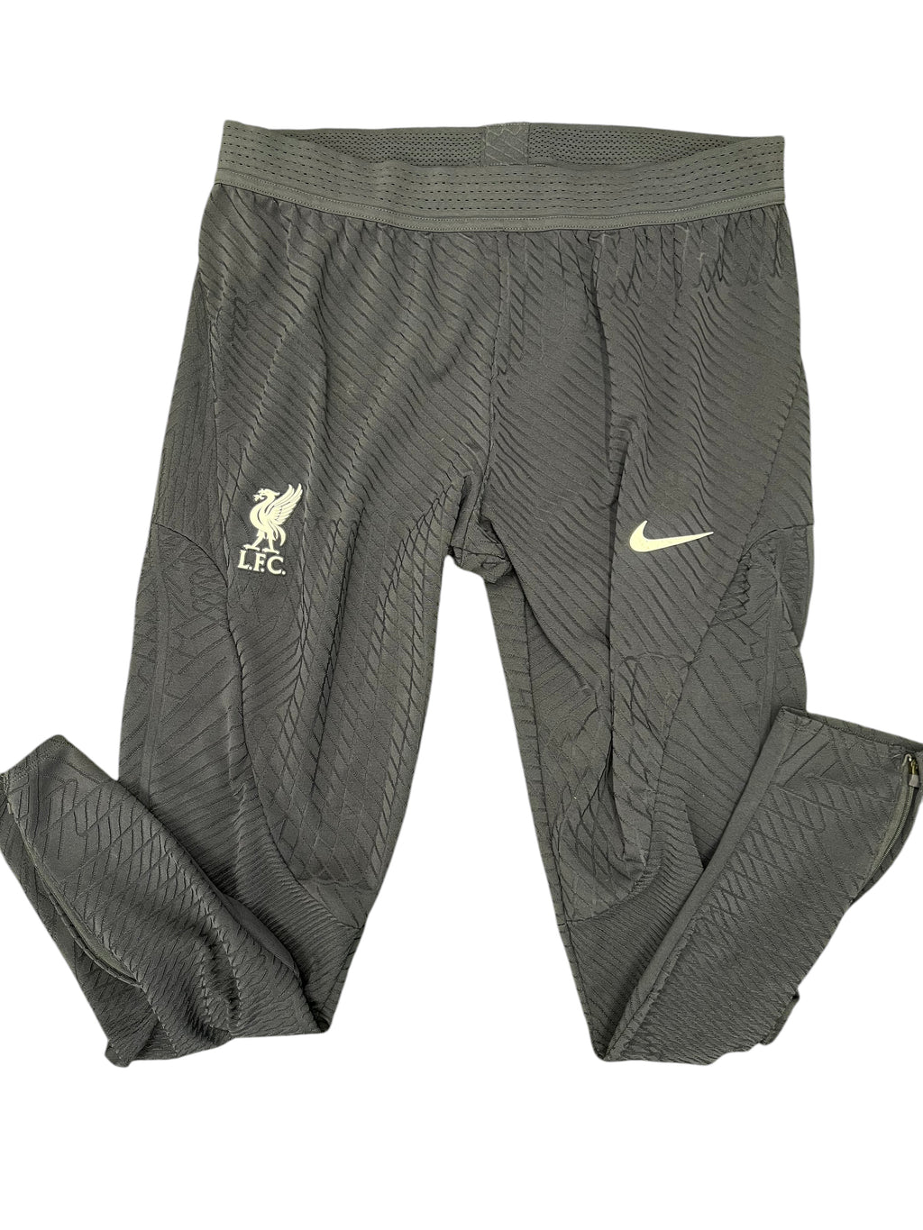 kitround Liverpool FC Dri-FIT training tights in black with textured pattern, Nike swoosh, and LFC crest. Features ankle zippers.