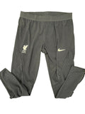 kitround Liverpool FC Dri-FIT training tights in black with textured pattern, Nike swoosh, and LFC crest. Features ankle zippers.