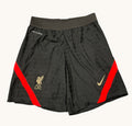 kitround Liverpool FC Nike Dri Fit shorts in black with red side stripes and gold LFC and Nike logos. Squad worn.