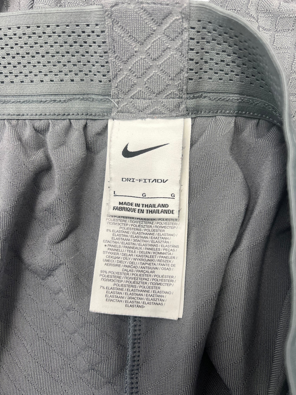 kitround Liverpool FC Men's grey polyester and elastane training bottoms with Nike Dri-FIT ADV technology.