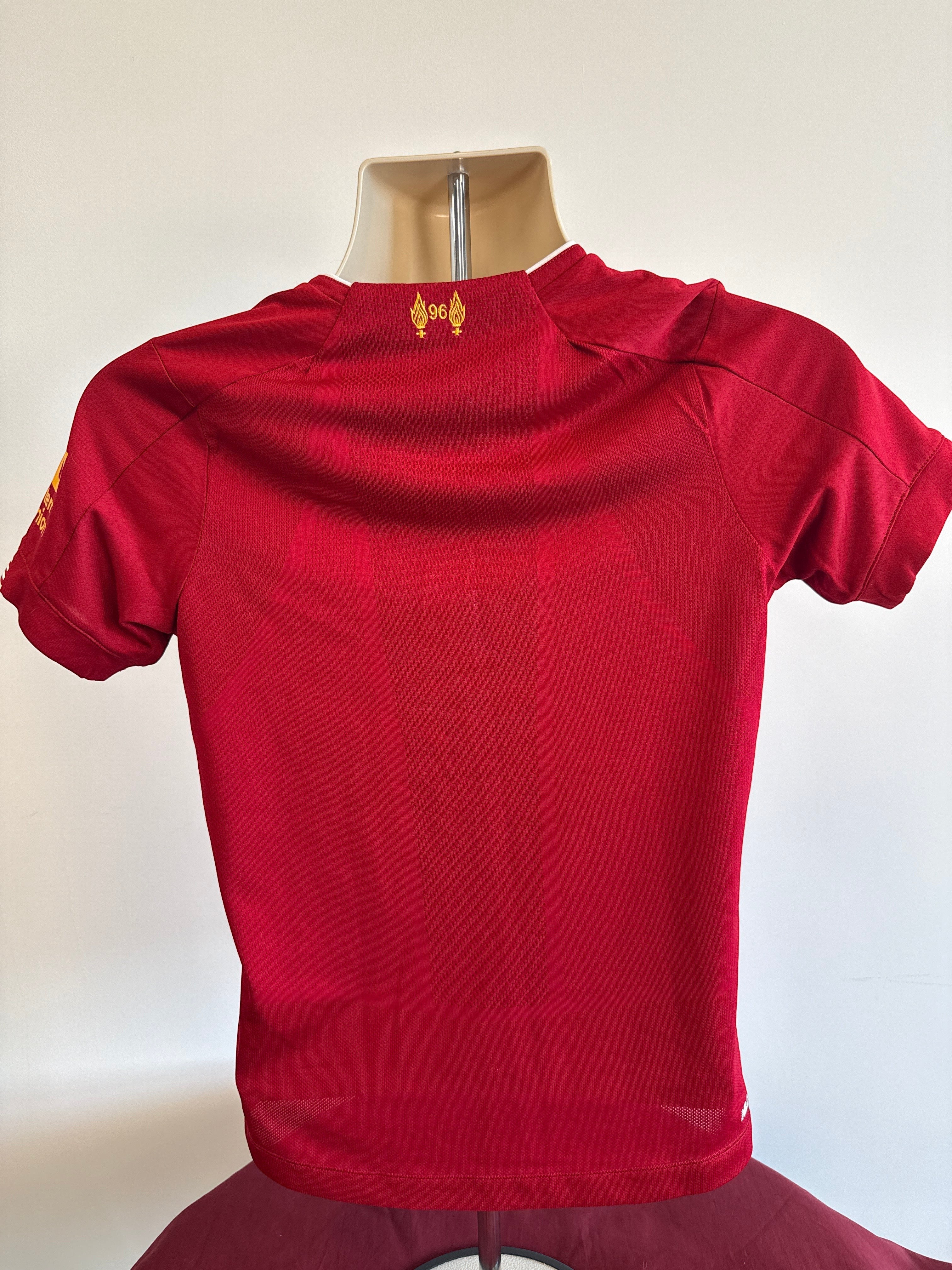 kitround junior Liverpool home football shirt in red with 96 emblem on the back neck
