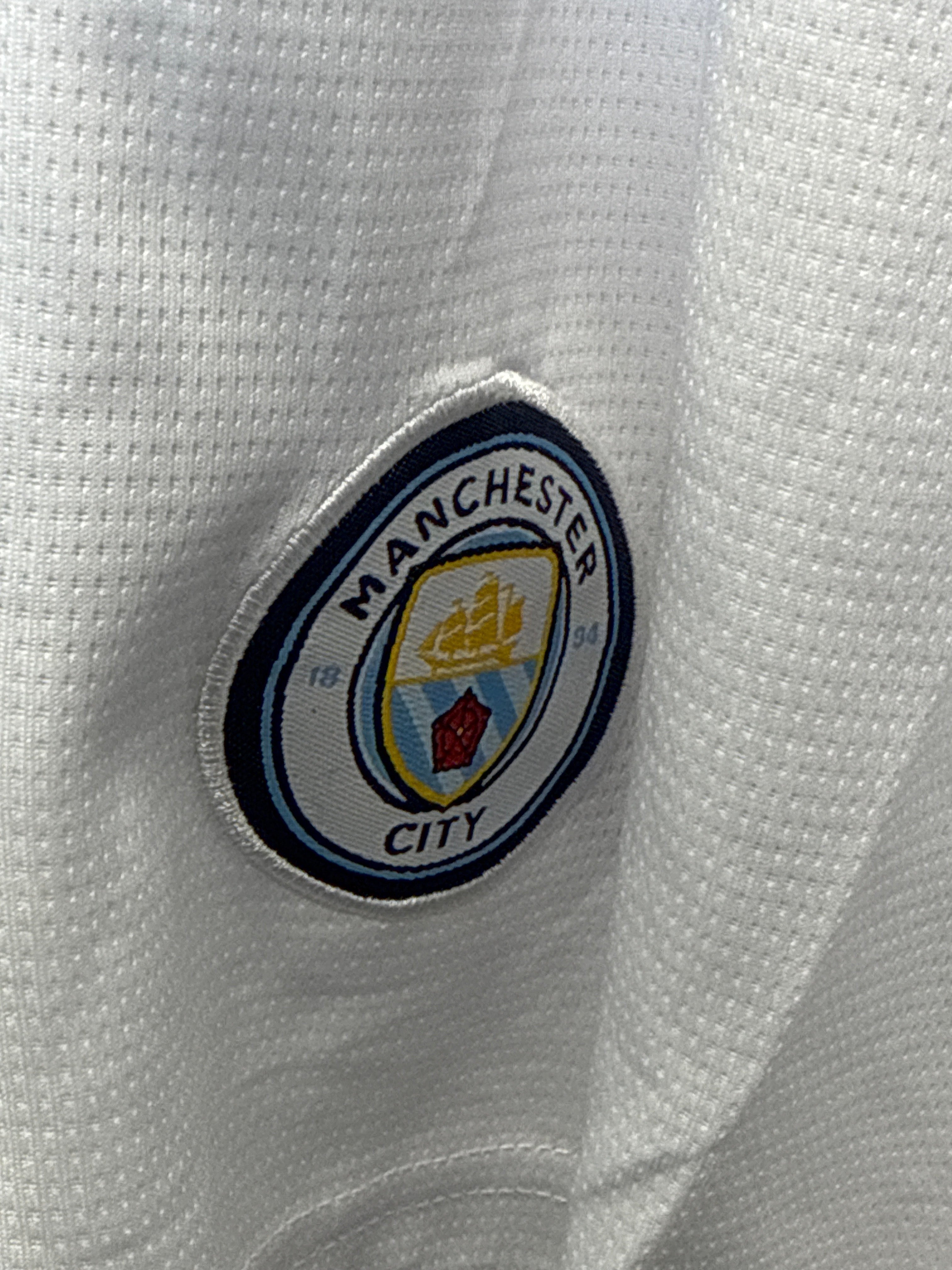 kitround Manchester City football shorts in white with the official club crest embroidered on the fabric