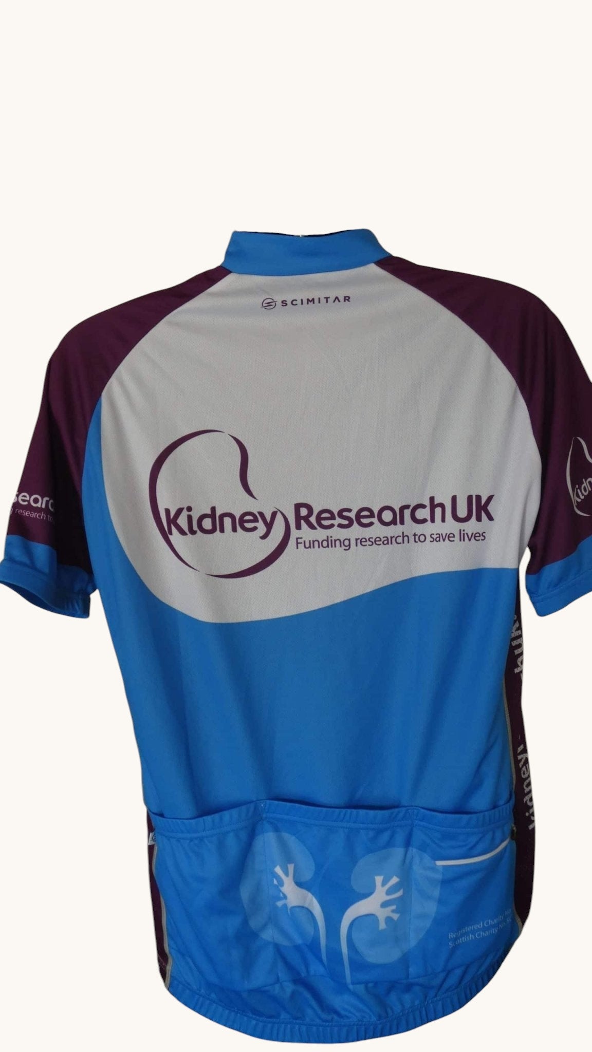 kitround Men's Scimitar cycling top in blue, white, and burgundy with Kidney Research UK logo and 3 back pockets.