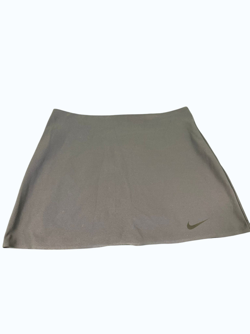Navy Blue Nike Dri-FIT Tennis Skirt with subtle swoosh logo on hem. Lightweight, breathable, and moisture-wicking fabric.