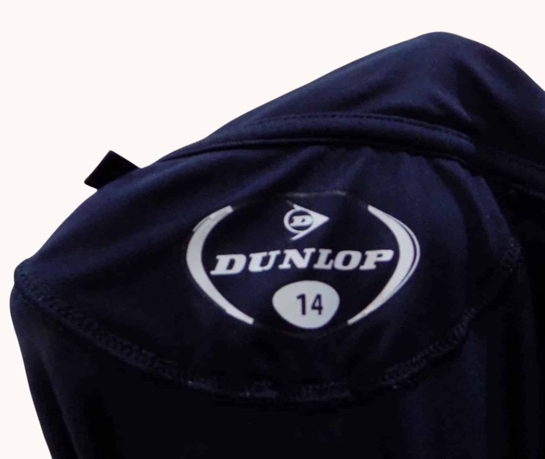 kitround navy blue tennis dress with popper placket and Dunlop logo pocket