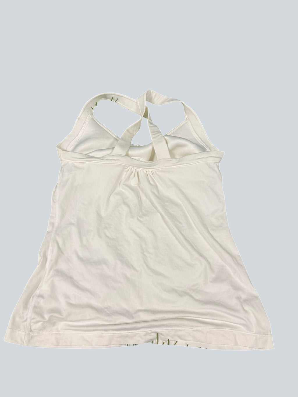 kitround white Nike Dri-FIT tennis tank top with crossed back straps and v-neck