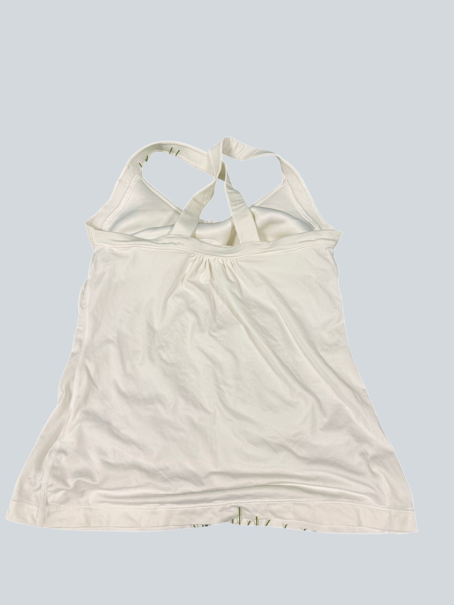 kitround white Nike Dri-FIT tennis tank top with crossed back straps and v-neck
