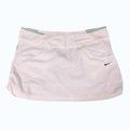 Nike white tennis skirt with side pockets and green striped waistband. Lightweight and breathable fabric.