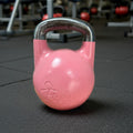 kitround 10kg pink cast iron kettlebell with a silver handle and Freyja logo, ideal for home workouts.