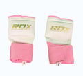 Pair of RDX pink and white boxing hand wraps with thumb loops, front view