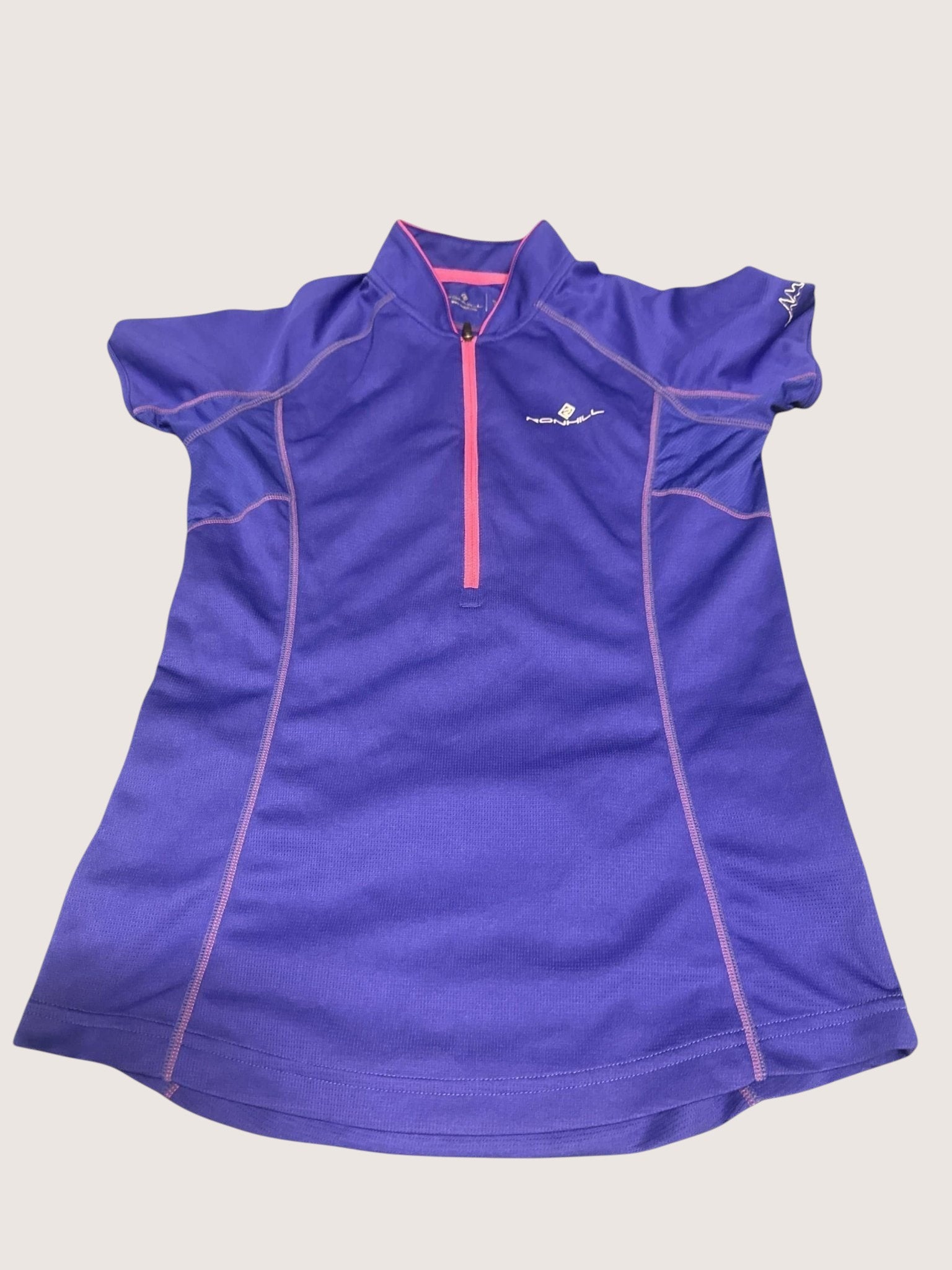 Kitround purple Ronhill cycling T-shirt with pink stitching and half-zip. Breathable fabric for outdoor activities.