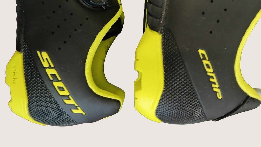 Scott MTB Comp Boa cycling shoes in matte black with yellow accents. Features Boa Fit System L6 and ventilation holes.